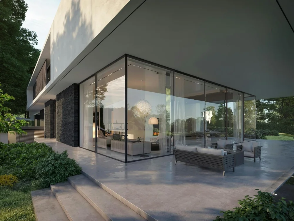 Baies vitrées en angle — Nos Murs Maison contemporaine avec baies vitrées sur deux façades autour d’un angle et terrasse